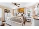 Main bedroom with a large bed, plenty of storage, and a ceiling fan at 3414 Alcan Way, Tucker, GA 30084