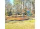 A well-maintained playground with swings and play equipment is perfect for children at 3414 Alcan Way, Tucker, GA 30084