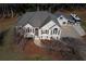 Aerial view of house, RV, and detached garage at 409 E Point Dr, Canton, GA 30115