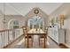 Formal dining room with hardwood floors and a large window at 409 E Point Dr, Canton, GA 30115