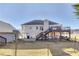 House exterior showcasing back deck and landscaping at 409 E Point Dr, Canton, GA 30115