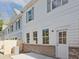 Home's exterior with gray siding and brick at 709 Trevett Way, Marietta, GA 30062