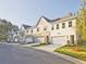 Exterior view of charming townhomes with attached garages at 709 Trevett Way, Marietta, GA 30062