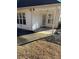 Covered back porch with concrete flooring at 790 Hiram Davis Rd, Lawrenceville, GA 30045