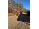 Wooden deck and stairs leading to a terraced backyard at 790 Hiram Davis Rd, Lawrenceville, GA 30045