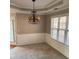 Elegant dining room with chandelier and wainscoting at 790 Hiram Davis Rd, Lawrenceville, GA 30045