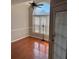 Bright dining room features hardwood floors and a large arched window at 790 Hiram Davis Rd, Lawrenceville, GA 30045