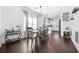 Modern dining area with dark hardwood floors and a six-person table at 1995 Meador Ave, Atlanta, GA 30315