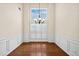 Formal dining room showcasing hardwood floors and a large window with abundant natural light at 33 Parklin Dr, Hiram, GA 30141