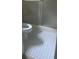 Clean bathroom with shower and tiled floor at 5710 Stewart Mill Rd, Douglasville, GA 30135