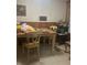 Casual dining area with table and chairs at 5710 Stewart Mill Rd, Douglasville, GA 30135
