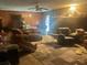 Living room with multiple sofas and a ceiling fan at 5710 Stewart Mill Rd, Douglasville, GA 30135