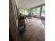 Sunroom with windows and various items at 5710 Stewart Mill Rd, Douglasville, GA 30135