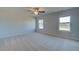 Large bedroom featuring ceiling fan and carpet at 245 Chiswick Loop, Stockbridge, GA 30281