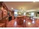 Basement bar area with custom bar and a pool table for entertaining at 5323 Lakesprings Dr, Dunwoody, GA 30338