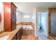 A modern bathroom features a soaking tub, double vanities, and tile floors at 5323 Lakesprings Dr, Dunwoody, GA 30338