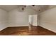 Large bedroom with hardwood floors and access to bathroom at 876 Nevis Way, Mcdonough, GA 30253