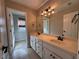 Bathroom with double vanity and updated fixtures at 234 Lake Ruby Dr, Suwanee, GA 30024