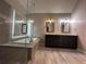 Bathroom with double vanity, soaking tub, and walk-in shower at 234 Lake Ruby Dr, Suwanee, GA 30024