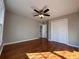 Bright bedroom with hardwood floors and double door closet at 234 Lake Ruby Dr, Suwanee, GA 30024