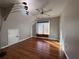 Spacious bedroom featuring hardwood floors and abundant natural light at 234 Lake Ruby Dr, Suwanee, GA 30024