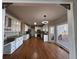 Eat-in kitchen with granite countertops and white cabinets at 234 Lake Ruby Dr, Suwanee, GA 30024