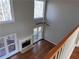 High ceiling living room with hardwood floors, fireplace and large windows at 234 Lake Ruby Dr, Suwanee, GA 30024