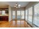 Bright breakfast nook with hardwood floors and a large window view at 2400 Stedman Sw Ln, Conyers, GA 30094