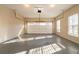 A spacious two-car garage with a window provides ample natural light at 2400 Stedman Sw Ln, Conyers, GA 30094