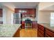A gourmet kitchen with stainless steel appliances and granite countertops at 2400 Stedman Sw Ln, Conyers, GA 30094
