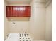 A laundry room with cabinets and a washing machine hook-up at 2400 Stedman Sw Ln, Conyers, GA 30094