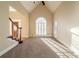 A living room with vaulted ceilings and large windows at 2400 Stedman Sw Ln, Conyers, GA 30094