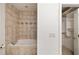 Relaxing bathroom with soaking tub and shower, complemented by an organized closet at 3245 Buckhead Forest Ne Mews, Atlanta, GA 30305