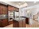 Modern kitchen with stainless steel appliances, granite countertops, and a gas cooktop island at 3245 Buckhead Forest Ne Mews, Atlanta, GA 30305