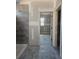Bathroom with shower, gray tile and doorway at 6851 Phillips Mill Rd, Douglasville, GA 30135