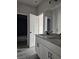 Bathroom with double sink vanity and tiled floor at 6851 Phillips Mill Rd, Douglasville, GA 30135