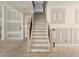 Staircase with wood and iron details at 6851 Phillips Mill Rd, Douglasville, GA 30135