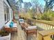 Spacious back deck provides a relaxing outdoor seating area with comfortable patio furniture at 2736 Joyce Ave, Decatur, GA 30032