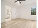 Bright bedroom with hardwood floors and ceiling fan at 2736 Joyce Ave, Decatur, GA 30032