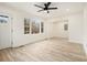 Bright living room featuring hardwood floors and large windows at 2736 Joyce Ave, Decatur, GA 30032