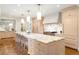 Large, open kitchen with marble countertops, island seating, and stainless steel appliances at 3180 Arden Nw Rd, Atlanta, GA 30305