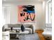 Living room boasts modern decor with gray sofa, patterned rug, and modern art adding a creative touch at 3180 Arden Nw Rd, Atlanta, GA 30305