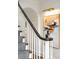 Beautiful staircase with a striking railing and a large piece of artwork hanging on the wall at 3180 Arden Nw Rd, Atlanta, GA 30305