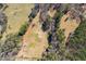 Aerial view of property showing house and expansive land at 446 Mcgukin Rd, Bremen, GA 30110