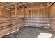 Empty interior of a rustic wooden horse stall at 446 Mcgukin Rd, Bremen, GA 30110