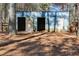 Exterior of rustic horse stables with three stalls at 446 Mcgukin Rd, Bremen, GA 30110