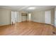 Large bedroom with hardwood floors and ample closet space at 12205 Highway 36, Covington, GA 30014