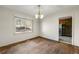 Dining room with hardwood floors and kitchen access at 12205 Highway 36, Covington, GA 30014