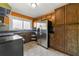 Kitchen with stainless steel appliances and wood cabinets at 12205 Highway 36, Covington, GA 30014