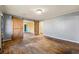 Living room with hardwood floors and barn doors at 12205 Highway 36, Covington, GA 30014